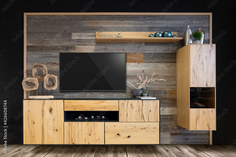 Wall mural trendy wall unit with television and old wood as a back wall with box shelf and decoration