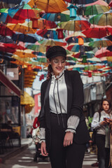 Fototapeta premium A latin woman walks through old Istanbul.