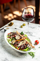 Salad with chicken liver. Fresh vegetable salad. Meat salad. banner, menu recipe place for text, top view