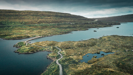 Panorama of Lake Toftavatn with hiking trail from above, Runavik, island Eysturoy, Faroe Islands.