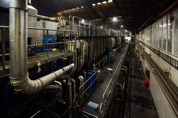 railing of the factory shop. fences for the safety of employees at work. industrial landscape of the factory interior