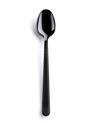 Plastic black disposable spoon isolated on a white background. Top view on white background, vertical orientation.