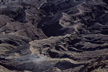 View from the top of Mount Bromo on people descending from the crater of this volcano, Bromo Tengger Semeru National Park