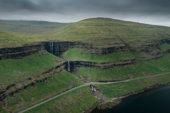 Fossa waterfall over two steps on Streymoy island, from above, Faroe Islands.