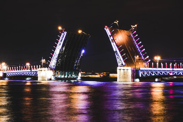 Fototapeta na wymiar Raised bridge at night in Saint-Petersburg, Russia.