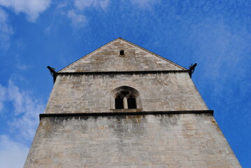 Fototapeta na wymiar Tour de la basilique romane de Saint-Ursanne, Jura, Suisse