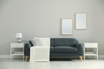 Stylish living room interior with comfortable sofa