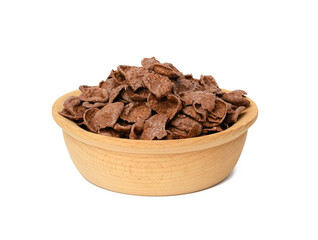 chocolate cornflakes in wooden plate isolated on white background
