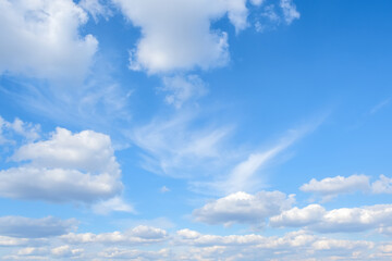 Blue sky with white clouds background with copy space for text, sky wallpaper with white fully clouds, wide angle