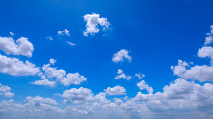 Blue sky in clear sunny day with white clouds