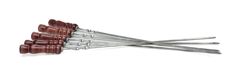 Metal skewers with wooden handle on white background
