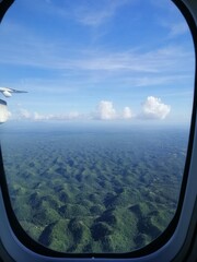 mountain view from a window of a plane