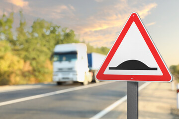 Sign Speed Bump near asphalt road outdoors