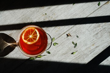 Cocktail in a glass on a stem, red. Alokolny