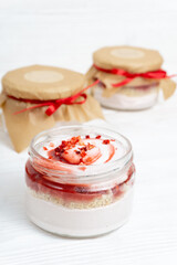 Marshmallow with jam in a transparent jar