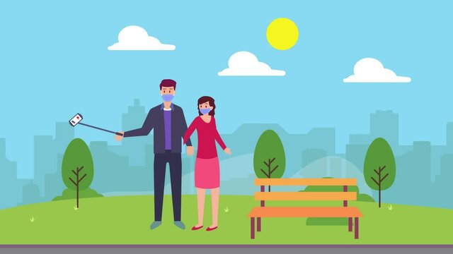 Young couple take selfie with cellphone at park