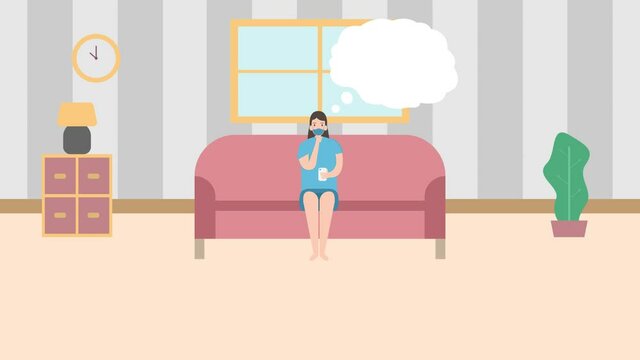 Young woman chatting on sofa with smartphone