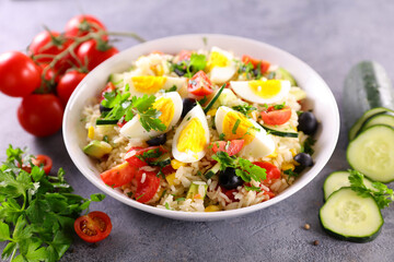 rice salad with egg,  tomato and cucumber