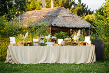 Nature outdoor festive banquet table set catering with appetizers