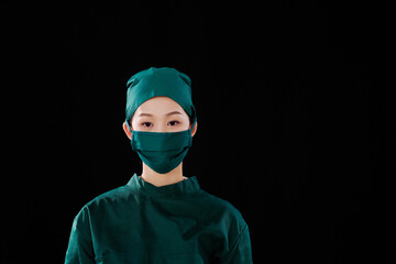 Portrait of a young female surgeon, bust