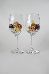 two glasses of flowers
