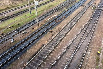 Fototapeta premium Many railroad tracks run diagonally from left to right and up.