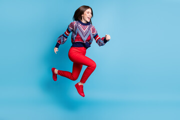 Fototapeta na wymiar Full length body size view of attractive cheerful girl jumping running active life isolated over bright blue color background