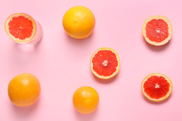 Composition with ripe grapefruits on color background