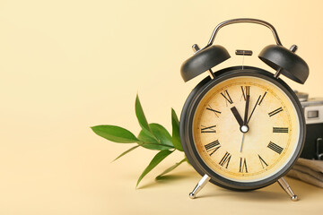 Alarm clock on color background