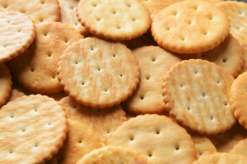 Tasty crackers as background, closeup