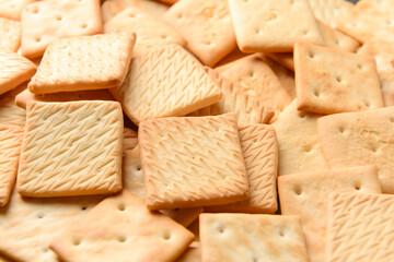 Tasty crackers as background, closeup