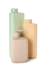 Different bottles of shower gel on white background
