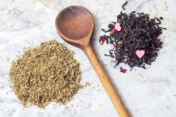 Cistus, in the form of dried leaves, in tea infusions on light background