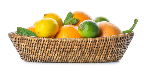 Basket with fresh citrus fruits on white background