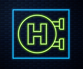 Glowing neon line Hospital signboard icon isolated on brick wall background. Vector
