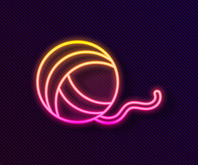 Glowing neon line Yarn ball icon isolated on black background. Label for hand made, knitting or tailor shop. Vector