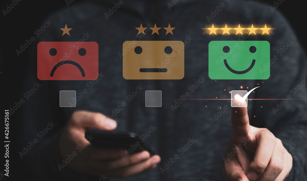 Poster businessman using mobile and touching to smiley face for customer survey product and service , custo