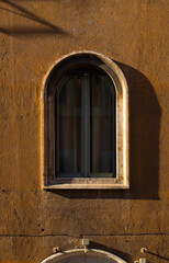 Fototapeta na wymiar Window at Via del Banco di Santo Spirito, Rome, Italy