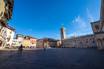 Cathedral Square in Trento downtown (Piazza del Duomo) with the Neptune fountain, Civic tower, Praetorian Palace and the frescoed houses Cazuffi Rella. Trentino Alto Adige, Italy, Europe.