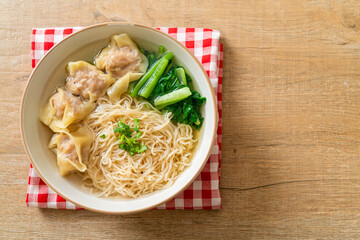 egg noodles with pork wonton soup or pork dumplings soup and vegetable