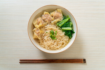 egg noodles with pork wonton soup or pork dumplings soup and vegetable