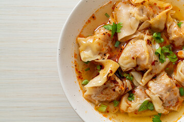 pork wonton soup or pork dumplings soup with roasted chili