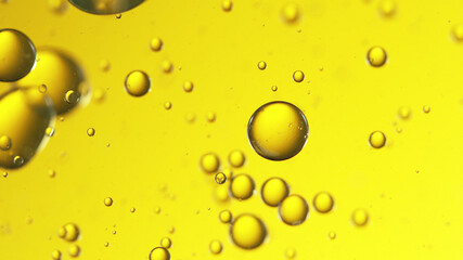Close up of golden oil bubbles