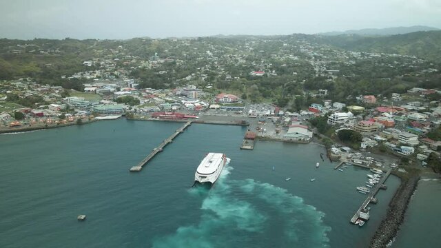 Tropical island of Tobago aerial view while a passenger ferry docks in the harbour