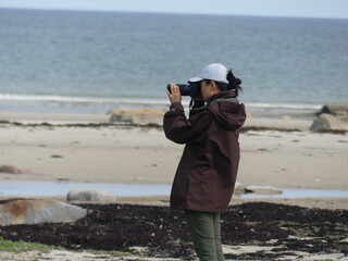 Obraz premium photographer on the beach