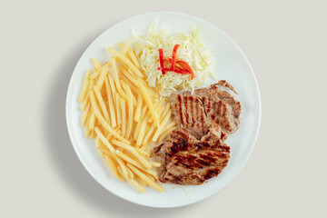 Pork with french fries and cabbage salad with bell peppers.