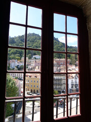 A view of the town of Sintra, Portugal, through the window of Sintra Palace
