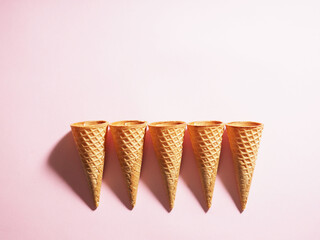Waffle Sweet ice cream cones. A range of waffle cups in a bright treatment of a sunny summer