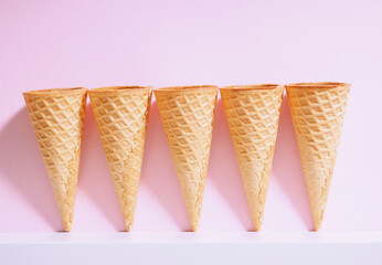 Waffle Sweet ice cream cones. A range of waffle cups in a bright treatment of a sunny summer