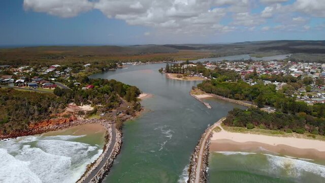 Aerial view away from the Evans Head village, sunny day - reverse, drone shot